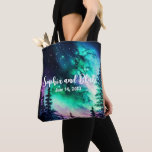 Celestial Northern Lights Wedding Tote Bag<br><div class="desc">🌟🛍️ Introducing Our Celestial Aurora Borealis Wedding Tote - A Perfect Wedding Favour 💫💒 Enhance the charm of your wedding celebration with our Celestial Aurora Borealis Northern Lights Wedding Suite, presenting an elegant and functional Wedding Tote. This stunning tote bag showcases a captivating portrayal of the serene forest against the...</div>