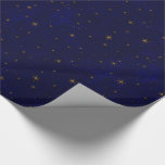 Celestial Starry Night Wrapping Paper<br><div class="desc">Large and small brass stars over a textured dark blue night sky.</div>