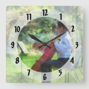 Cellist in the Garden Square Wall Clock