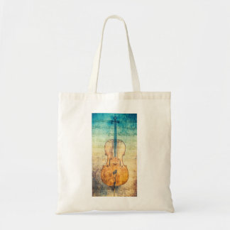 Cello with colourful sheet music background tote bag
