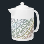 Celtic Filigree Teapot<br><div class="desc">Beautiful original Celtic pattern with a hint of colour to brighten any table,  lovely for your own home,  or to gift to someone who just loves a nice cup of tea.  Matching mugs etc are available</div>