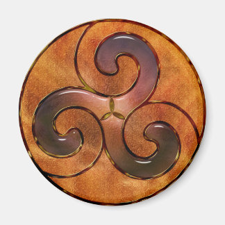 celtic triskele on gold magnet