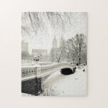 Central Park Winter - Snow on Bow Bridge Jigsaw Puzzle<br><div class="desc">This fine art photo features a beautiful winter landscape in Central Park, New York City in classic black and white. Snow covers Bow Bridge, one of Central Park's most famous works of architecture. The towers of San Remo sit in the distance as seen through the bare branches of trees heavy...</div>