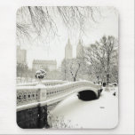 Central Park Winter - Snow on Bow Bridge Mouse Mat<br><div class="desc">This fine art photo features a beautiful winter landscape in Central Park, New York City in classic black and white. Snow covers Bow Bridge, one of Central Park's most famous works of architecture. The towers of San Remo sit in the distance as seen through the bare branches of trees heavy...</div>