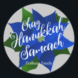 Chag Hanukkah Sameach - Blue Poinsettia Hanukkah Classic Round Sticker<br><div class="desc">Blue Poinsettia Hanukkah classic round sticker with grey background and Chag Hanukkah Sameach(Happy Hanukkah Holiday) saying,  below is your family name which you can personalise. A beautiful sticker to close Hanukkah greeting card envelopes or to seal Hanukkah gifts.</div>