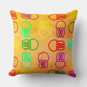 Chained Rings of Colours on Rugged Peach Colour Cushion
