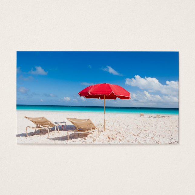 Chairs and umbrellas on a tropical beach (Front)