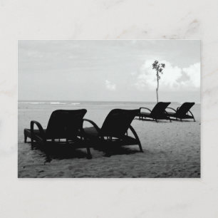 Chairs and umbrellas on the beach postcard