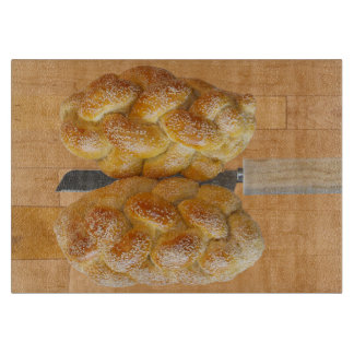 Challah On Cutting Board With Knife