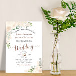 Champagne Blush Watercolor Floral Wedding Invitation<br><div class="desc">This champagne blush wedding invitation features a rustic watercolor floral design with hand painted roses and flowers in shades of ivory and cream, with eucalyptus leaves foliage and greenery. The lettering is done in fancy script calligraphy with a classic white background. The back of the invite is a pale peach...</div>