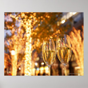 Champagne glasses toasting Christmas on city Poster