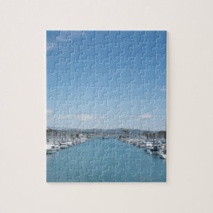 channel in harbour on a sunny day with blue sky jigsaw puzzle
