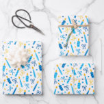 Chanukah Candles Burning White Blue Gold Wrapping Paper Sheet<br><div class="desc">Sometimes you just have a few items to wrap for Chanukah, and you don't want to buy a huge roll of Chanukah wrapping paper that will linger in your closet for years. This selection of three Chanukah wrapping paper sheets is perfect for wrapping a few gifts. Three separate sheets of...</div>