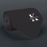 Charcoal Gray Elegant Monogram   Name | One-Sided Tie<br><div class="desc">An elegant one-sided necktie featuring a bold white monogram across a Charcoal Gray background. On top of this monogram sits your first or last name spelled out in all capitals. If you prefer a bolder look for the personal name inside of the large letter you can do the following: Use...</div>