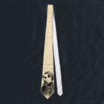 Charles Dickens Cream Tie<br><div class="desc">Do you relish reading his novels? Do you know someone who does? Then these Charles Dickens ties are must have for any tie collection. The Charles Dickens ties - available in six different colours - feature a picture of Charles Dickens near the base of the tie. The background contains the...</div>