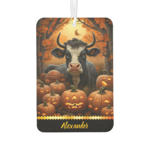 Charming cow among glowing pumpkins in autumn glow car air freshener