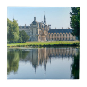Chateau de Chantilly and reflection in a pond Tile