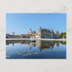 Chateau de Chantilly with reflection in a pond Postcard