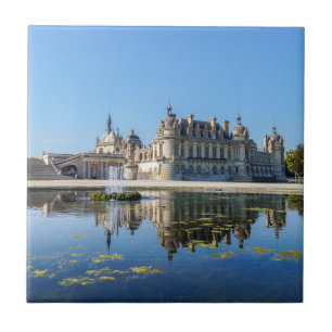 Chateau de Chantilly with reflection in a pond Tile