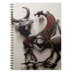 Cheek piece of a horse bit in the form of a human- notebook