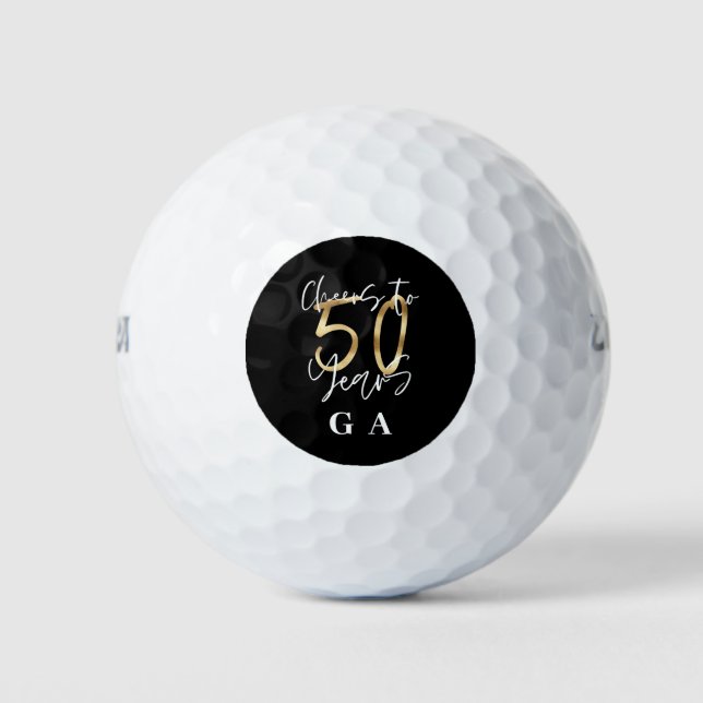 cheers to 50 years modern black and gold golf balls (Front)