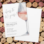Cheers To 60 Years 60th Birthday Party Invitation<br><div class="desc">"Cheers to 60 years!" is proudly displayed at the top of this classic and elegant invitation, featuring a large watercolor pink and grey wine glass on the right side, giving it a modern twist. You can customise the year to celebrate any milestone. The design uses script typography for "Cheers to...</div>
