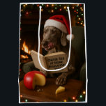 Cheese Tax Christmas gift bag - Weimaraner<br><div class="desc">Individually designed Christmas gift bag featuring a Weimaraner reading a book entitled 'Cheese Tax at Home Regulations 2025'.

We all know The Cheese Tax must be paid - rules are rules!</div>