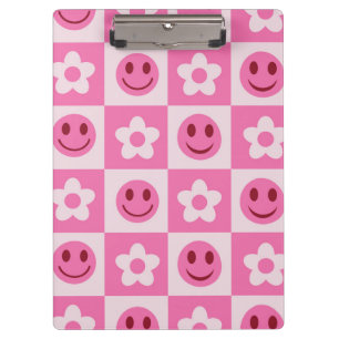 Chequered flowers and happy faces pink clipboard