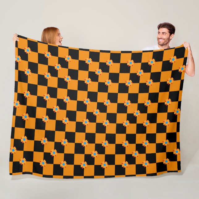 Chequered flowers orange and black fleece blanket (In Situ)