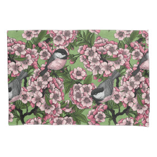 Cherry blossom and chickadees on green pillowcase