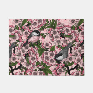 Cherry blossom and chickadees on pink doormat