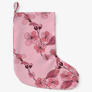 Cherry blossom in pink colour on white background. small christmas stocking