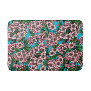 Cherry blossom on blue bath mat