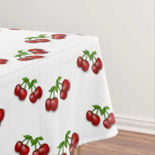Cherry fruits on white tablecloth