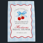 Cherry Sweet Blue Coquette Bow Bridal Shower Favou Medium Gift Bag<br><div class="desc">Someone Cherry sweet is tying the knot and you’re the cherry on top of their sweet celebration. Add a nostalgic touch to your bridal shower with this Blue Gingham Cherry Party Decor featuring vibrant red cherries tied with a coquette bow and a pastel blue gingham pattern, all within a red...</div>