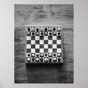 Chess Board Game on Rustic Wooden Table Poster