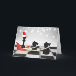 Chess Santa Claus and Reindeer Christmas Holiday Card<br><div class="desc">This funny chess Christmas card design features Santa's sleigh and reindeer. The Santa Claus is the King chess piece wearing a Santa hat and the reindeer are two Knight chess pieces. They are on a chessboard in front of a winter snow scene with holiday lights. Easily customise the inside with...</div>