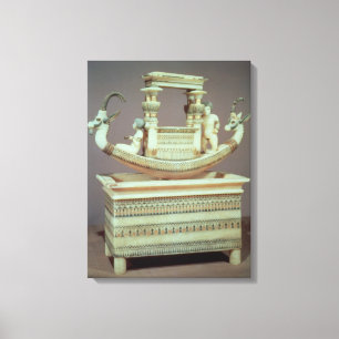 Chest with a boat decorated with two heads canvas print