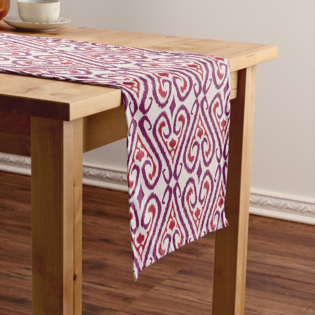Chic colourful red and purple ikat damask patterns short table runner (In Situ)