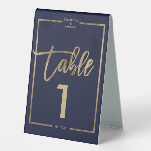 Chic gold frame script navy blue table number