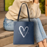 Chic Heart Navy Blue Personalized Tote Bag<br><div class="desc">This navy blue tote bag is personalized with your name in a simple font over a large white heart. Ideal for yourself,  for your bridesmaids,  book club,  graduation gift,  birthday gift,  teacher's gift or any occasion. MORE colors in our store.</div>