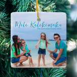 Chic Mele Kalikimaka Family Beach Vacation Photo Ceramic Ornament<br><div class="desc">Chic customisable beach family photo Christmas ornament with your favourite tropical photo in the sun. Add a full photograph of your favourite memory from your island vacation to the coast on the front and one on the back. A beautiful coastal holiday ornament gift with pretty blue script over the picture....</div>