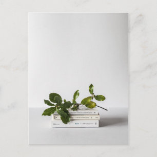chic minimal pile of books botanical literary postcard