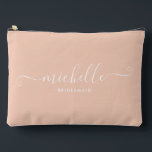Chic Minimalist Peach Pink Personalised Bridesmaid Accessory Pouch<br><div class="desc">Introducing our Chic Minimalist Peach Pink Personalised Bridesmaid Accessory Pouch, a stylish and versatile gift designed to celebrate your bridesmaids in elegance. This accessory pouch is the epitome of modern chic, perfect for any occasion from bridesmaid proposals to bridal showers. Crafted with a minimalist design, this pouch features a deep...</div>