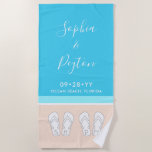 Chic Modern Beach Wedding Honeymoon Anniversary Towel<br><div class="desc">The bride and groom will love personalised beach towels as a keepsake gift for a seaside wedding. All text is simple to customise. Pastel coral and light turquoise blue design features bright white typography, names, initials, wedding date, location, and monogrammed flip flops on an abstract modern minimalist beach. The handwritten...</div>
