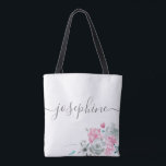 Chic Pink Grey watercolor floral name Bridesmaid Tote Bag<br><div class="desc">"The Ultimate Bridal Companion": Chic Pink Grey Watercolor Floral Bridesmaid Tote Bag Steeped in elegance and brimming with practicality, this tote bag is more than just an accessory – it’s a statement, an emotion, a cherished keepsake. 🔹 Highlights: Personal Touch: Celebrate your bridesmaid with a name elegantly scripted across the...</div>