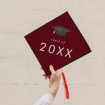 Chic Red Hat Class Year Graduation Cap Topper<br><div class="desc">This chic red hat class year graduation cap topper is perfect for a modern graduation. The simple design features classic dark burgundy red and white typography with a black and gold watercolor graduation hat.

Personalise your graduation cap with the year.</div>