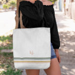 Chic Retro Stripes Monogram Tote Bag<br><div class="desc">A minimalist monogram design with large typography initials in a classic font with your name below and chic retro rainbow coloured stripes. Every woman needs a good carry all to tote around all of her essentials. Whether it's a bridesmaid gift, a birthday gift or even just a nice little gift...</div>