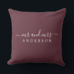 Chic Script Mr Mrs Burgundy Newlywed Monogram Cushion<br><div class="desc">Chic, modern monogrammed pillow with the text Mr and Mrs in white elegant script on a burgundy background. Simply add your married name. Perfect gift for the newlywed couple. Exclusively designed for you by Happy Dolphin Studio. If you need any help or matching products please contact us at happydolphinstudio@outlook.com. We're...</div>