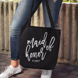 Chic Script Personalised Maid of Honour Tote Bag<br><div class="desc">Gift your maid of honour with this super cute personalised tote bag! Trendy and modern black and white design features "maid of honour" in white handwritten script typography on a black background. Easily customise with your maid of honour's name using the template field provided.</div>